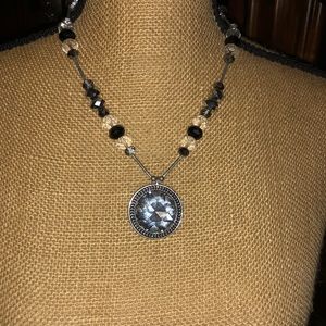 Beaded necklace with crystal pendant